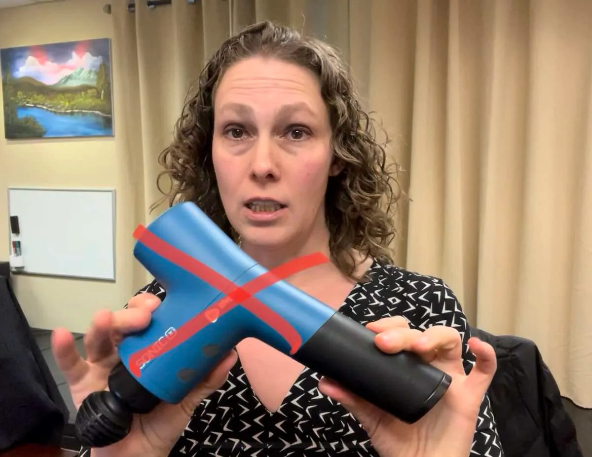 Do not use massage gun behind ear