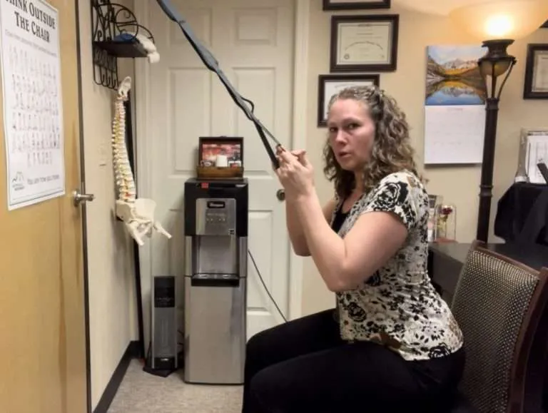 Strap assisted air squat