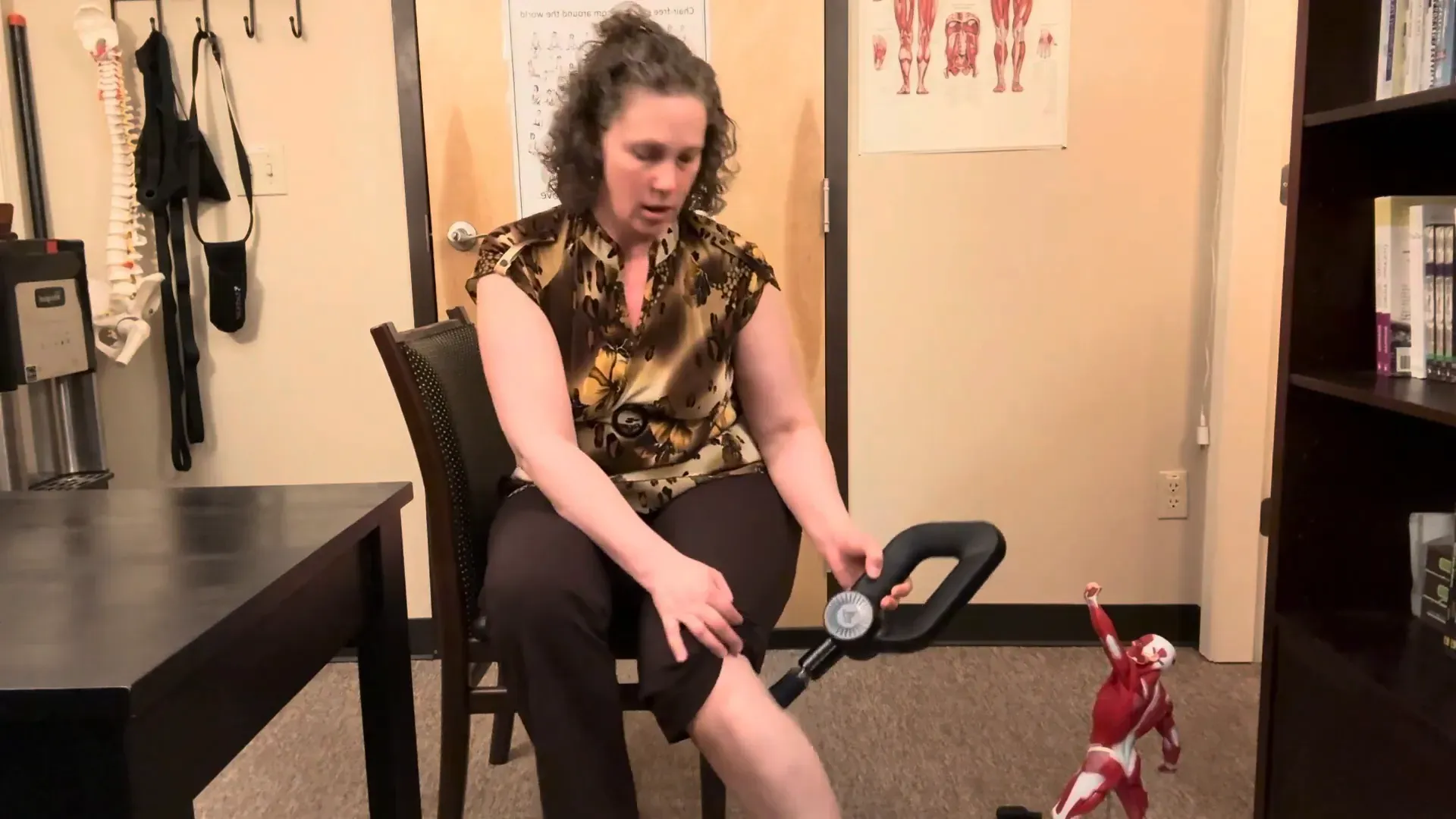 Working on outside of calf muscle with leg on floor